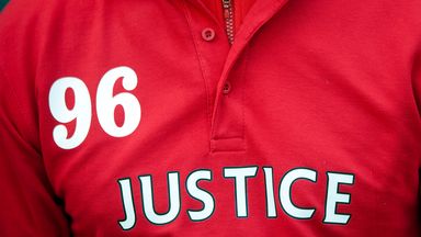 A fan wears a shirt in memory of the Hillsborough disaster 